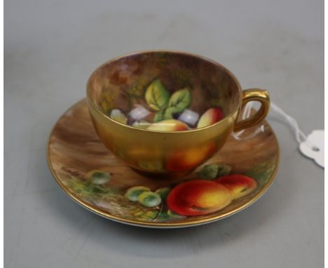 Hand painted Royal Worcester tea cup and saucer 