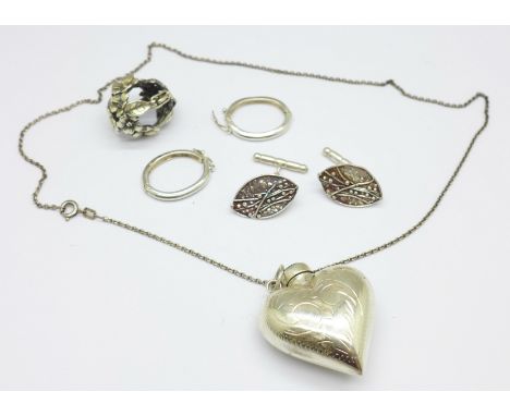 A scent bottle and chain, three scarf clips and a pair of cufflinks, all test as silver 