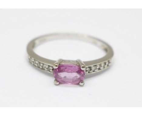 A 9ct white gold, pink sapphire ring with diamond shoulders, 1.8g, M 