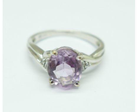 A 9ct white gold and amethyst ring with diamond shoulders, 2.8g, O 