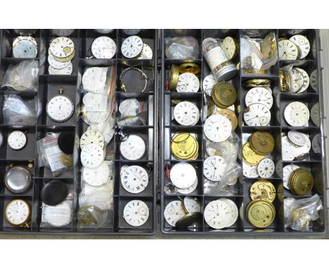 A large collection of pocket watch movements and dials plus an Action Timer stopwatch 