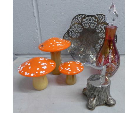 Three Caithness glass mushrooms, a glass scent bottle, a pierced dish and a novelty axe in tree trunk, signed **PLEASE NOTE T