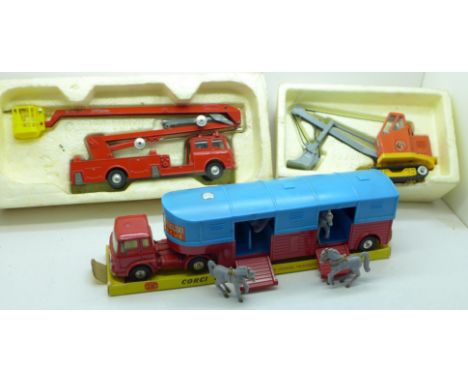 Three Corgi Major Toys, 1127 Simon Snorkel Fire Engine, 1128, Priestman 'Cub' Shovel and 1130, Circus Horse Transporter with 