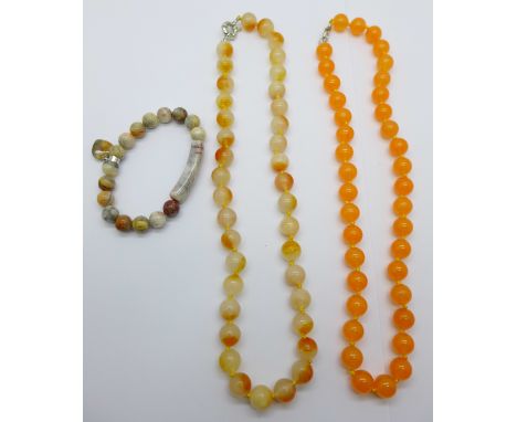 Two jade bead necklaces and a jasper bracelet 