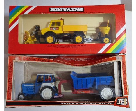 Two Britains diecast models comprising of a 9630 Ford 5000 Tractor and Rear Dump &amp; a 9595 Snow Plough &amp; Gritter, both