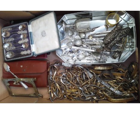 A box of assorted metal ware including Chinese white metal spoons, watch straps, silver etc. 
