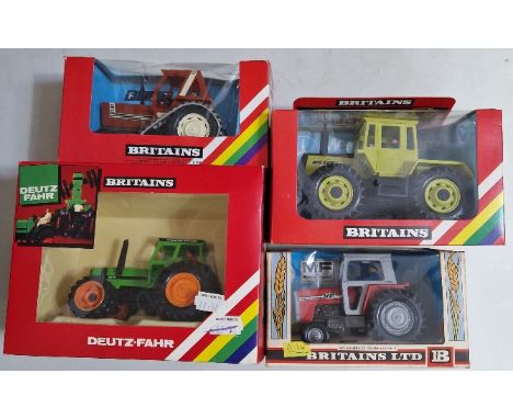 Four Britains diecast models comprising of a 9525 Mercedes-Benz Tractor, a 9527 Fiat Half-Track Tractor, a 9530 Deutz Eight-W