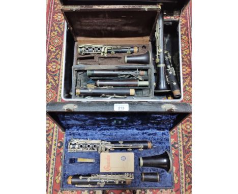 A Buffet Cahampon &amp; Cie Clarinet in hard case together with two others (as found), one marked 'F Buisson' Paris'. 