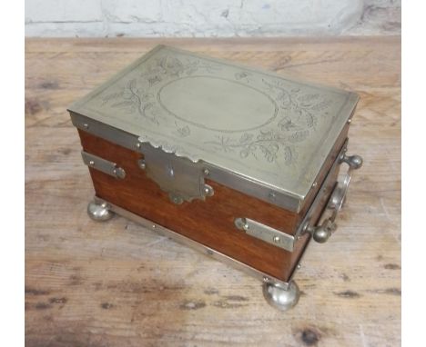 A silver plated oak tea caddy, circa 1900, the tope engraved with butterflies and acorns.Condition:- General wear through age