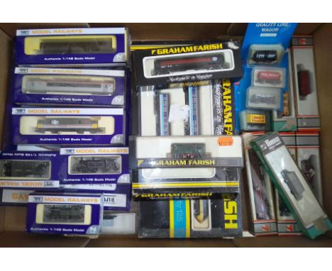 A boc of assorted N gauge model railway including Dapol, Graham, Peco and Lima.