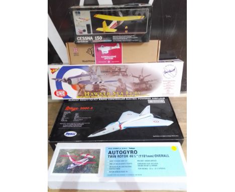 A group of five unbuilt aircraft kits comprising a Mirage 2000-5, a Balsacraft Hawker Sea Fury, a Union Model Co Cessna 150, 