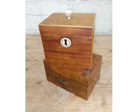 A 19th century mahogany tea caddy with bone finial and escutcheon, together with another box. 