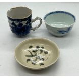 Three pieces of porcelain including cups and saucers