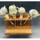 Four vintage bottle pourers
