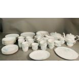 A vintage Royal Stafford English bone china dinner service in Blossom Time Floral pattern, gold line