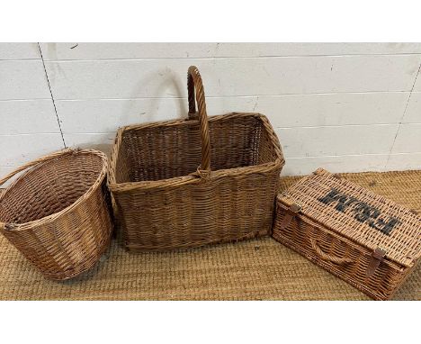 Three wicker baskets to include a small Fortnum and Mason hamper 