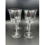 A set of two boxed heals wine glasses