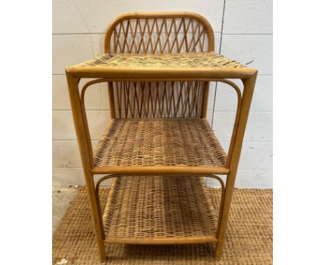 A three shelf bamboo cane side table with galleried top 