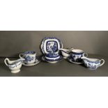 A selection of blue and white china to include large cups and saucers, sauce boats and a plate,
