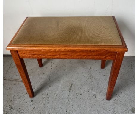 A velvet covered piano stool (H48cm W60cm D35cm)
