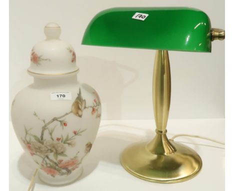 A desk lamp with green glass shade and a glass urn and cover Condition Report:Not available for this lot.