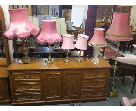 A 20th century brass standard lamp, pair of cast brass table lamps, two further brass table lamps and cut glass table lamp (6