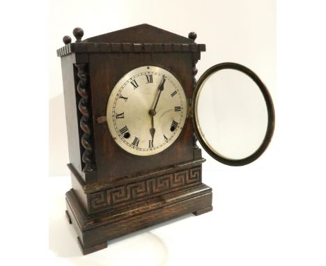 An American dark wood mantle clock with movement by William Gilbert Clock Co Condition Report:Available upon request