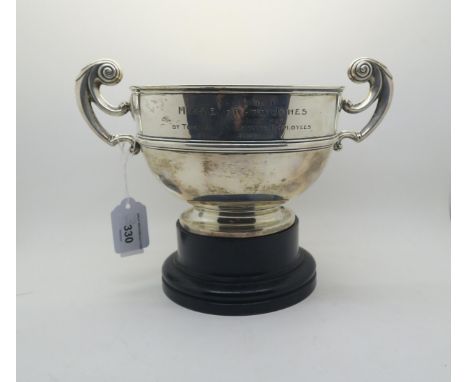 A George V silver trophy cup, engraved 'Presented to Miss Everard Jones on her Marriage by Torcastle Estate Employees 1913", 