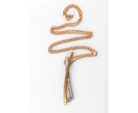 A 9ct gold diamond set pendant with a 9ct chain. Set with estimated approx 0.30cts of brilliant cut diamonds, length of penda