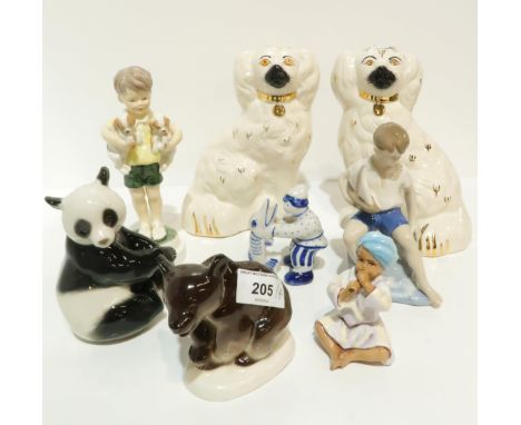 A Royal Worcester India figure, another All Mine both designed by F.G Doughty, a pair of wally dugs, Lomonosov figures and an
