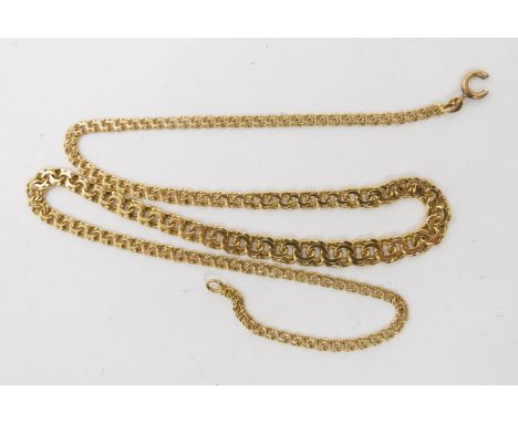 A gilded white metal enamelled egg pendant with continental marks, together with a yellow metal chain, weight of chain 3gms C