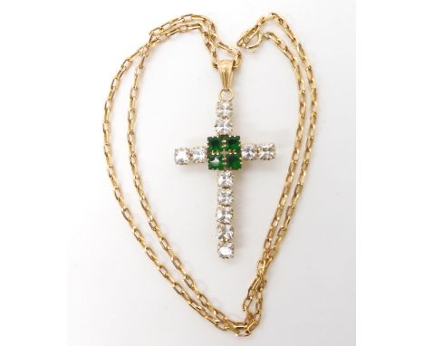 A 9ct gem set cross, length with bail 5.2cm, 9ct chain length 44cm, weight 7.6gms Condition Report:Available upon request