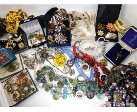 A collection of costume jewellery to include snake bangle and watch, 1960's bowling badges and other items Condition Report:N