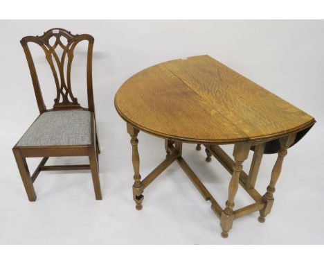 A Victorian mahogany Chippendale scroll back dining chair and an oak drop leaf table with turned uprights (2) Condition Repor