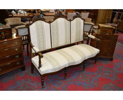 An Edwardian three seat salon sofa