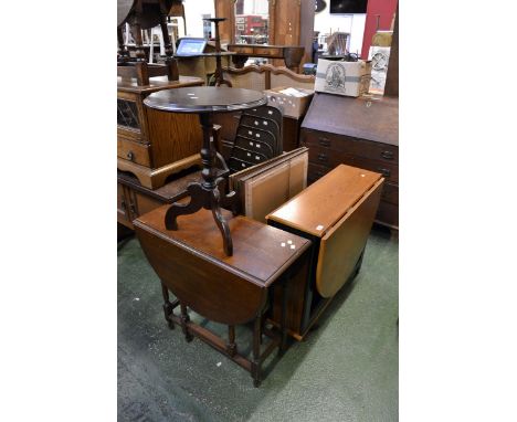 An oak dropleaf table; a kitchen utility table; a tripod occasional table