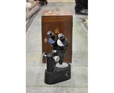 A W Watsons binocular microscope, serial no.115033, black lacquered body, cased, with accessories