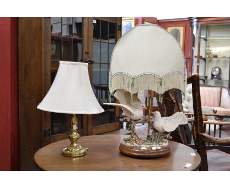 A Capo-di-Mont type lamp, modeled with two doves, mahogany base