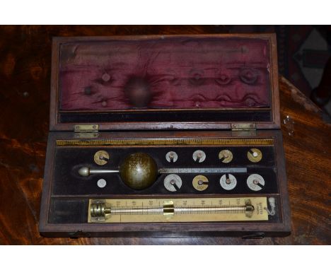 A mahogany cased Sykes hydrometer