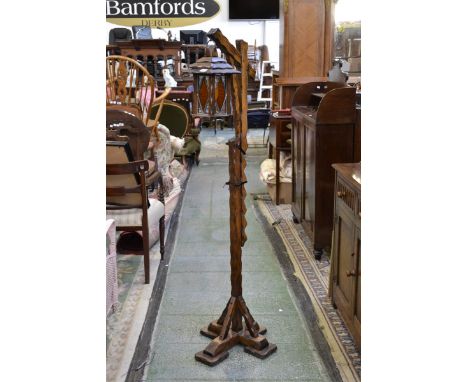 An oak gibbet standard lamp.
