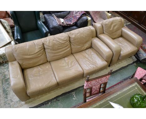 A contemporary caramel leather three seat sofa and conforming armchair.