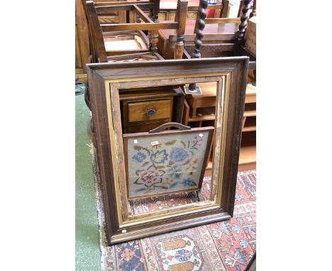 A large rectangular oak picture frame;  another smaller;  an oak framed embroidered fire screen (3)