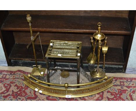 A 19th century brass and steel footman; a brass fender; a brass companion set; a lamp converted from balance scales; etc