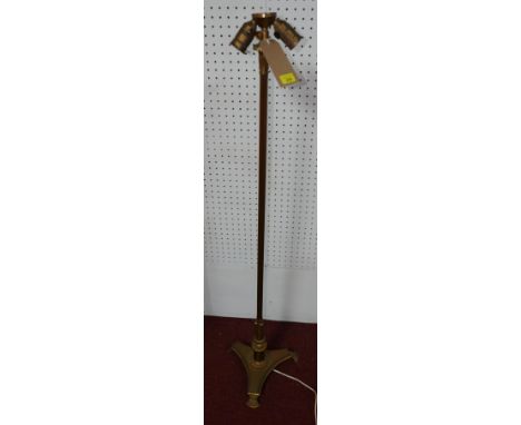 A gilt metal Corinthian column standard lamp, on capped tripod base, H.135cm 