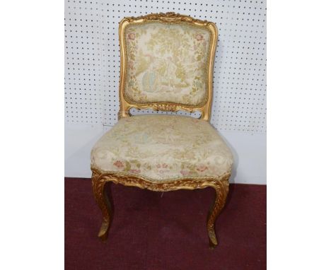 A late 19th / early 20th century Louis XV style side chair, the upholstery decorated with figures and flowers, on cabriole le