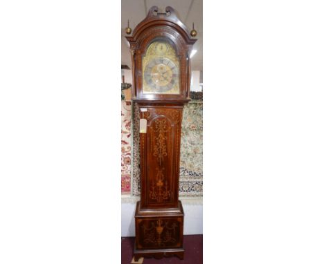 An 18th century mahogany and marquetry inlaid longcase clock, three train movement, eight chiming bells and striking gong, ar