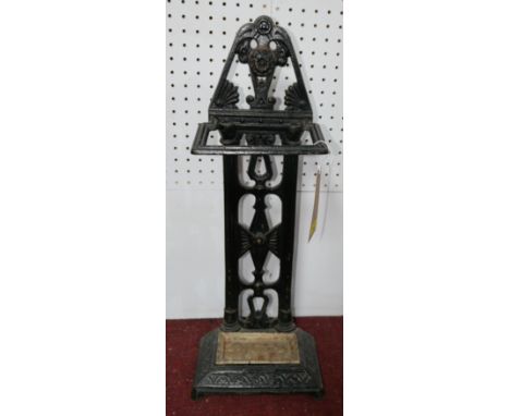 A Victorian cast iron stick stand, with drip tray, raised on stepped rectangular base, H.70cm 