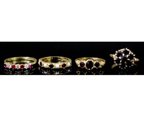 Four 9ct gold mounted garnet and gem set rings (sizes J, L, N+ and K - total gross weight 8.2 grammes)