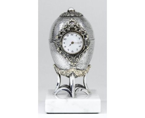 An Elizabeth II silver and silver gilt "Easter egg clock" from the St. James's House Company, the 17mm diameter dial with Ara