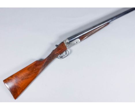 A 12 bore side by side shotgun by Sabel, Serial No. PG100487, the 27ins blued steel barrels with plain top rib, bright steel 